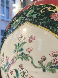 A pair of Chinese famille rose black-ground jars and covers with mountainous landscape design, Yongzheng