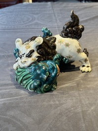 A Japanese polychrome-glazed group of playing Buddhist lions, 18/19th C.