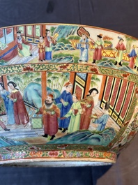 A large Chinese Canton famille rose bowl with a bronze stand, 19th C.