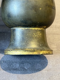 A rare Chinese parcel-gilt bronze ritual wine vessel, 'zhi 觯', Ming