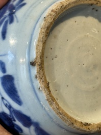A Chinese blue and white kendi with floral design, Wanli
