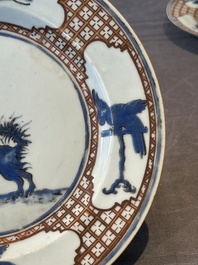 A pair of Chinese 'leaping pekinese' plates, possibly after a design by Cornelis Pronk, Qianlong, ca. 1740