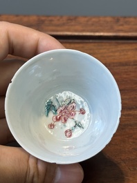 Nine Chinese famille rose cups and eight saucers, Yongzheng/Qianlong