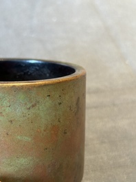 A small Chinese bronze cylindric tripod censer, Xuande mark, Ming