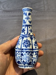 A Chinese blue and white facetted bottle vase with floral design, Kangxi