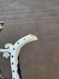 A pair of Chinese blue and white ewers with floral design, Kangxi