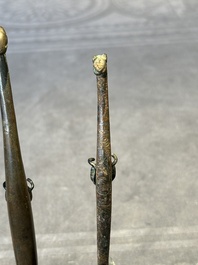 A varied collection of six Chinese bronze belt hooks, Warring States period and Western Han