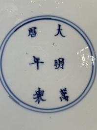 Two Chinese blue and white plates with figural design, Wanli and Kangxi mark, Kangxi