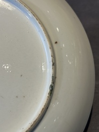 Two Chinese Canton famille rose 'mandarin subject' plates and a saucer, Qianlong
