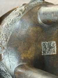 A fine Chinese bronze censer and cover with a Buddhist lion, 'ding 鼎', Xuande Mark, Ming