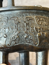 A fine Chinese bronze censer and cover with a Buddhist lion, 'ding 鼎', Xuande Mark, Ming