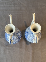 A pair of Chinese blue and white ewers with floral design, Kangxi