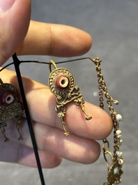 Three pairs of gold earrings with pearls and two gold pendants, Roman Era, 2nd/3rd C.