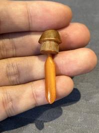 A rare Chinese rhinoceros horn snuff bottle in the shape of a Buddha hand, 19th C.