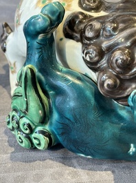 A Japanese polychrome-glazed group of playing Buddhist lions, 18/19th C.