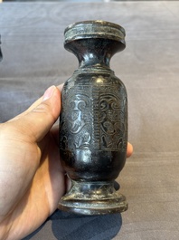 A Chinese bronze vase and a Taoist figure-shaped incense burner, Ming