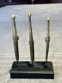 A varied collection of six Chinese bronze belt hooks, Warring States period and Western Han