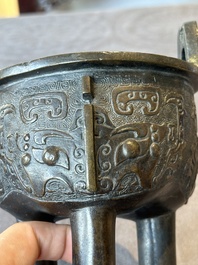A fine Chinese bronze censer and cover with a Buddhist lion, 'ding 鼎', Xuande Mark, Ming