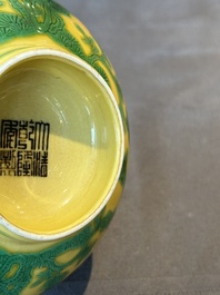 A pair of Chinese yellow-ground 'peach and bird' bowls, Qianlong mark and probably of the period