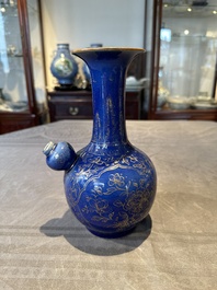A Chinese gilt-decorated powder-blue kendi with floral design, Kangxi
