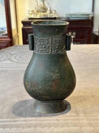 A Chinese silver-inlaid bronze arrow vase with Taotie design, 'touhu 投壺', Ming