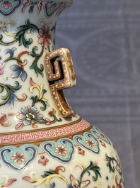 A pair of Chinese famille rose vases with floral design, Jiaqing mark, 19/20th C.