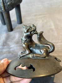 A fine Chinese bronze censer and cover with a Buddhist lion, 'ding 鼎', Xuande Mark, Ming