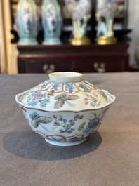 An exceptional Chinese gilt-decorated doucai and famille rose covered bowl with butterflies and floral design, Jiaqing mark and of the period