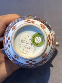 A Chinese English-decorated blue and white jug and cover, Kangxi
