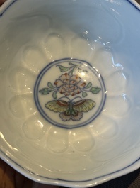 An exceptional Chinese gilt-decorated doucai and famille rose covered bowl with butterflies and floral design, Jiaqing mark and of the period