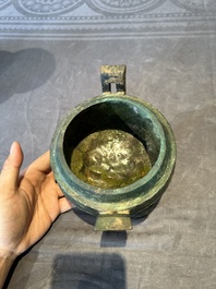 Two Chinese archaic bronze food vessels, 'ding 鼎', Han