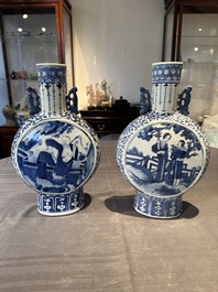 A pair of Chinese blue and white moonflasks or 'bianhu', Kangxi mark, 19th C.