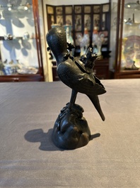 A rare Chinese bronze 'parrot' incense burner, Ming