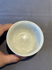 A pair of rare Chinese reticulated white-glazed biscuit 'Eight Immortals and Shoulao' bowls, Wanli