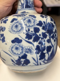 A Chinese blue and white bottle-shaped huqqa base with floral design for the Islamic market, Kangxi