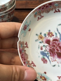 Nine Chinese famille rose cups and eight saucers, Yongzheng/Qianlong