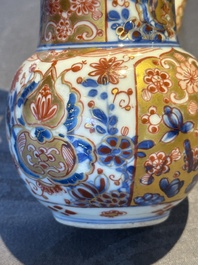 A Chinese English-decorated blue and white jug and cover, Kangxi