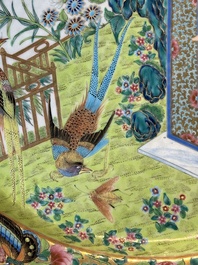 A Chinese Canton famille rose dish with a lady, servant and pheasants, 19th C.