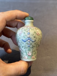 Two Chinese famille rose 'lotus scroll' snuff bottles and a flamb&eacute;-glazed snuff bottle, 19th C.
