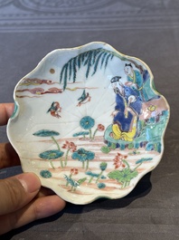 A Chinese famille rose relief-decorated 'lotus' cup and saucer, Yongzheng