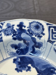 A Chinese blue and white 'hunting scene' 'klapmuts' bowl and a vase with a silver cover, Kangxi