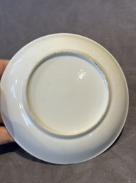 Two Chinese Canton famille rose 'mandarin subject' plates and a saucer, Qianlong