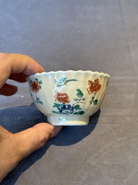 A pair of Chinese famille verte cafe-au-lait-ground cups and saucers, Kangxi