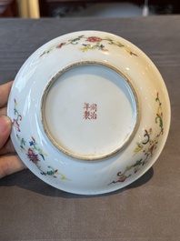 A pair of Chinese yellow-ground famille rose plates with butterfly design, Tongzhi mark, 20th C.
