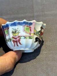 A Chinese famille rose cup and saucer with a reclined lady, Qianlong