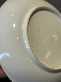 Two Chinese Canton famille rose 'mandarin subject' plates and a saucer, Qianlong