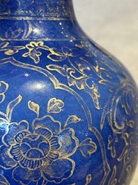A Chinese gilt-decorated powder-blue kendi with floral design, Kangxi