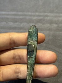 A varied collection of six Chinese bronze belt hooks, Warring States period and Western Han