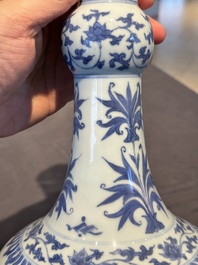 A Chinese blue and white 'lotus scroll' bottle vase, Transitional period