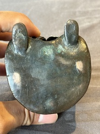 A Chinese bronze vase and a Taoist figure-shaped incense burner, Ming